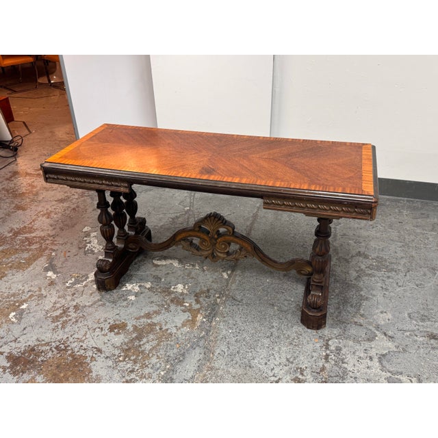 Design Plus Gallery presents a Vintage Renaissance Revival Style Draw-Leaf Parquetry Top Table. This table has a...
