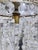 Vintage Hollywood Regency Crystal Waterfall Chandelier With Ornate Brass Frame For Sale - Image 4 of 9