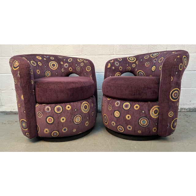 A standout pair of swiveling lounge chairs by Weiman, offering a perfect blend of comfort, craftsmanship, and distinctive...