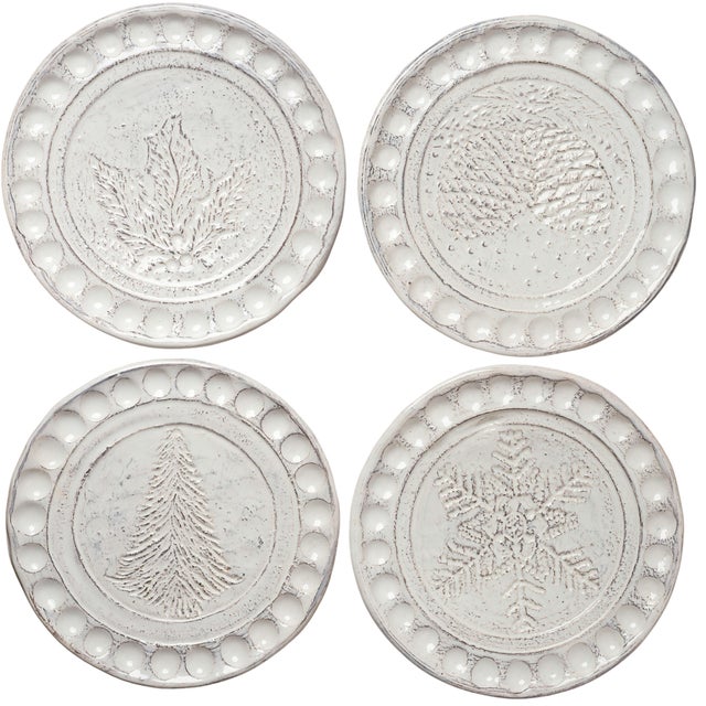 Our new white Christmas collection is elegant and understated. Each piece is etched w/a different Christmas motif....