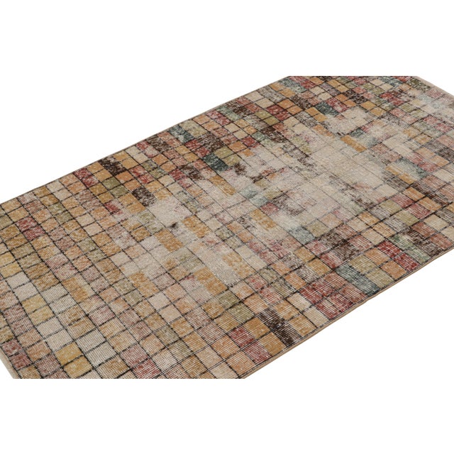 Handknotted in wool, this 3x6 vintage Art deco Zeki Múren rug originates from Turkey, circa 1960-1970 and is latest to...