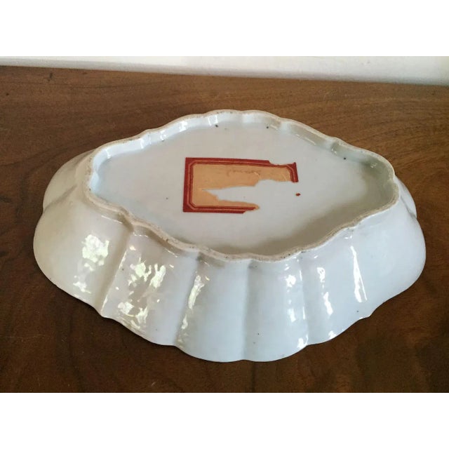 Two graduated 18th c. Chinese export porcelain lozenge shape dishes for the American market. Each decorated with a blue...