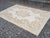This is a beautiful vintage hand knotted distressed finish Rug from Turkey.. This is Handwoven by the tribal women of...