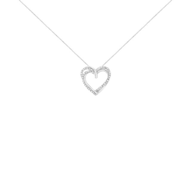 This stunning and classic diamond pendant is fashioned in .925 sterling silver. The design features a double looped heart...