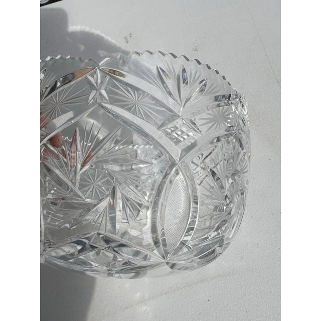Fifth Avenue Glass Crystal Bowl. Heavily carved with serrated edges. This has star , sunburst and pinwheel designs. 24%...