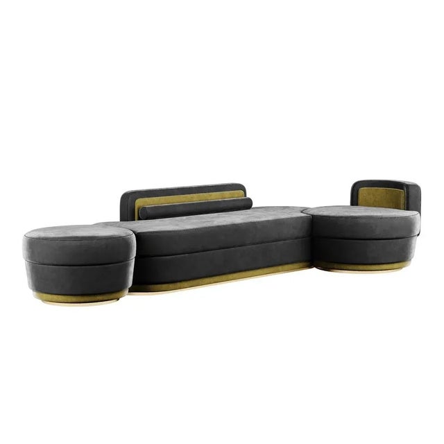 Cluedo Sofa is a Memphis design style sofa. A curved modern sofa upholstered in velvet, with surprising side table...