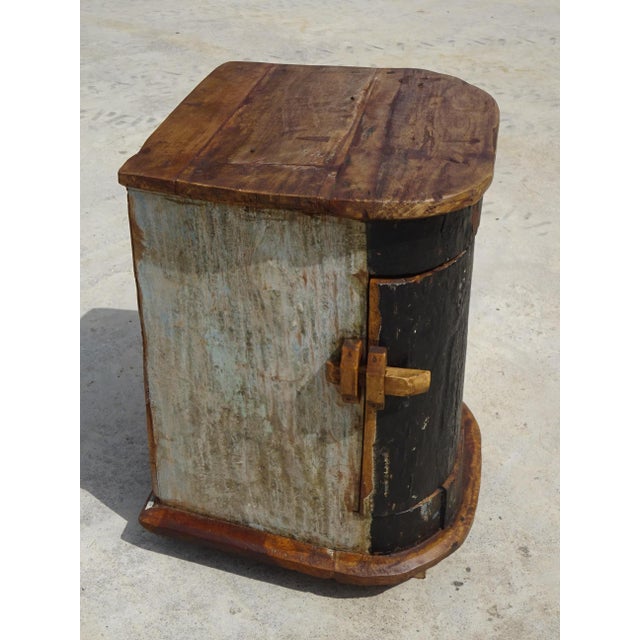 Bedside table or storage unit in solid teak reclaimed from a boat. Recycled wood from a dugout canoe, curved design. Teak...