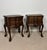 Elegant pair of Spanish Louis XV style bedside tables crafted in oak with richly carved decorative details and graceful...
