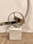 Modern John Richard Petite Ribbon Sculpture. Polished silver frame on square marble bottom. Original Retail $875. Showroom...