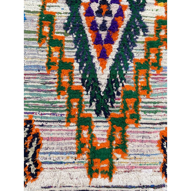 Hand-woven by the Berber women in the Atlas Mountains, this Vintage rug is created with soft natural wool fibers from the...