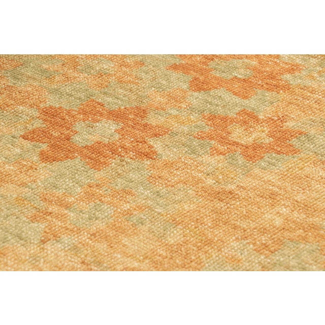 Hand-knotted in wool, this 3x4 modern rug, originating from India, as inspired by modern art with a take on floral...