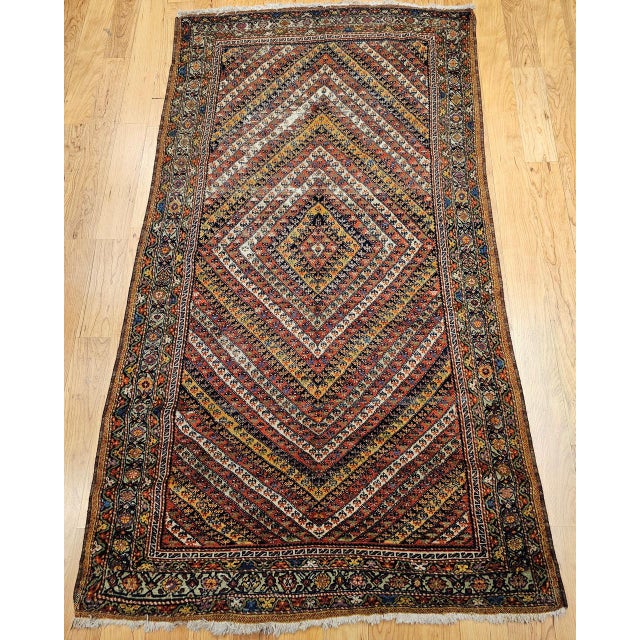 "An exquisite early 20th century Persian Senneh 'Hashtrang' rug, masterfully handwoven with the exceptional fineness and...