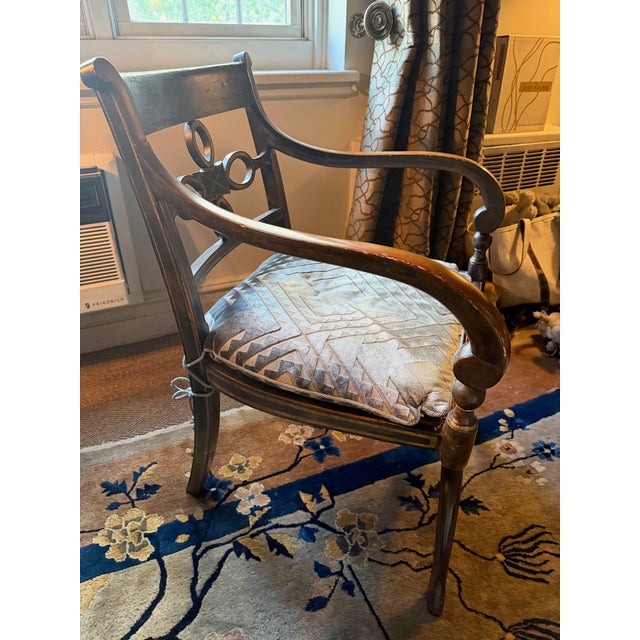 This sensational English Regency painted arm chair is in excellent condition with minor wear to the edges on the arms. I...