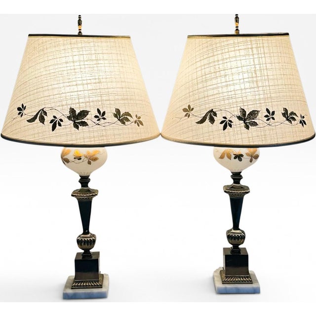 Mid-Century Neoclassical Brass and Painted Milk Glass Grapevine Lamps - A Pair Exude a timeless aura of mid-century...