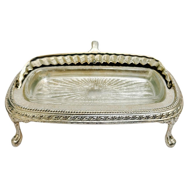 Vintage revolving roll-top butter dish designed in the Victorian tradition with a dramatic roll-top dome lid with a deep...