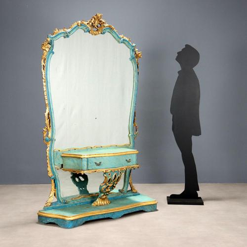 Carved and lacquered wood console table with a faux marble finish. The outer frame, like the moldings, is composed of...