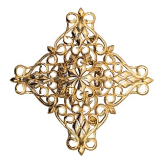 Vintage 1969 Signed Monet Goldtone Openwork Brooch For Sale