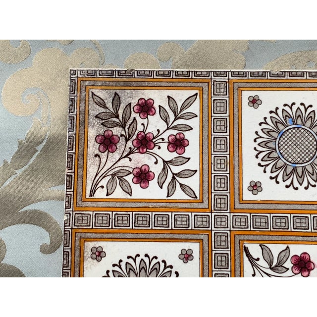 A sublime example of English craftsmanship from the Arts & Crafts movement. This hand-painted porcelain tile captures the...