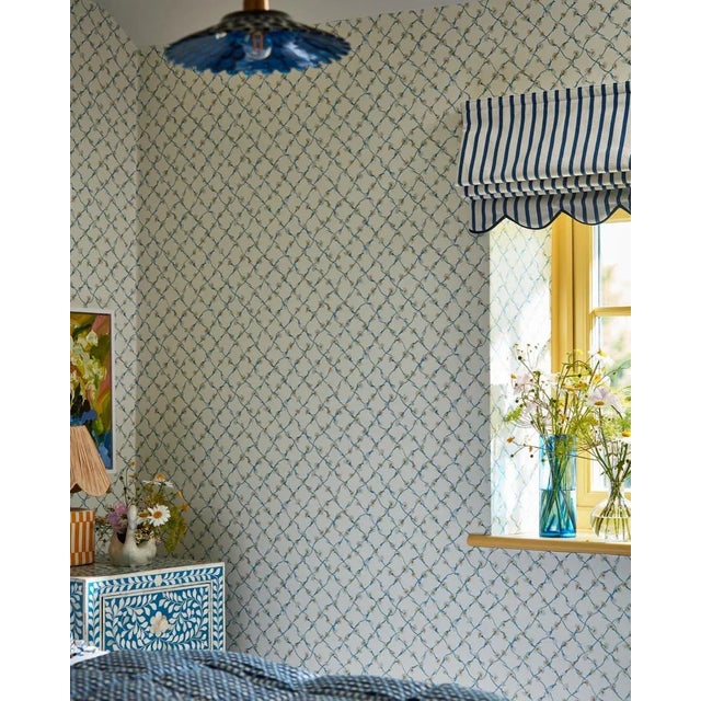 Charming daisies picked from the garden and hand painted in the studio link together to create this pretty trellis...