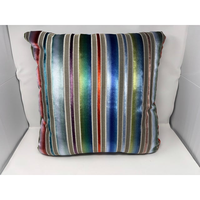 This is a stunning brand new throw pillow made with a colorful rainbow striped fabric. It features a down filled insert...