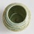 With a reactive glaze and hand finished ribbing detail, this charming sage green pot is a great find. Plant your favorite...