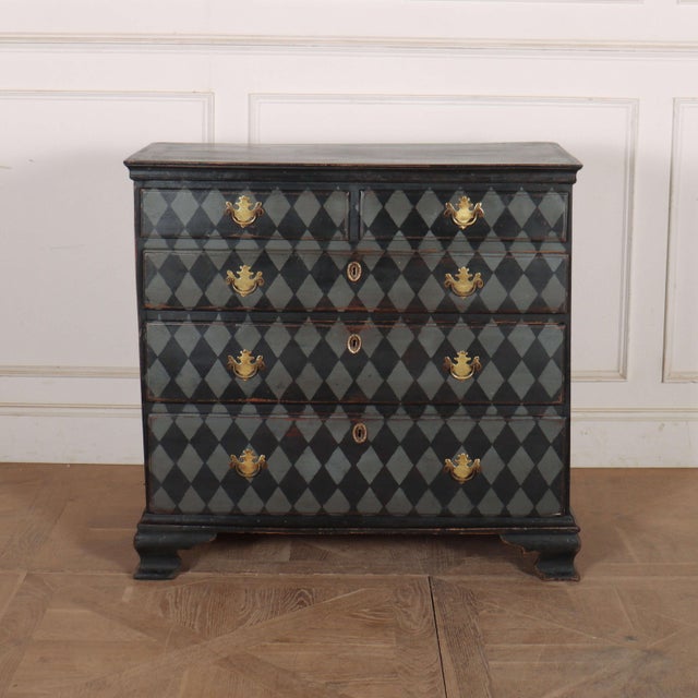 18th century English painted oak chest of drawers with a harlequin design. 1790. Internal reference: H This piece is...