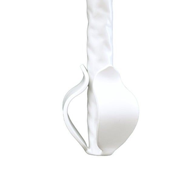 The Linda Wall Sconce features a tole leaf design in perfect powder coat matte white. Wonderful for elegant dining and...