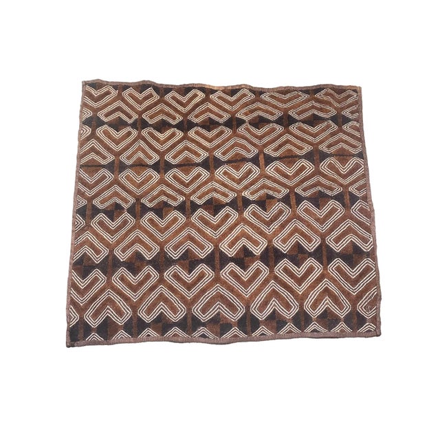 This vintage Kuba Kasai Velvet Boutallah raffia textile from Zaire, Africa, showcases a geometric pattern handcrafted from...