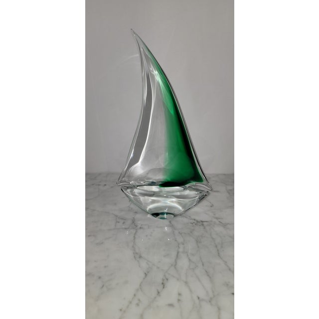 Bring the beauty of the sea into your home with this elegant hand-blown green Oggetti Murano art glass sailboat sculpture....