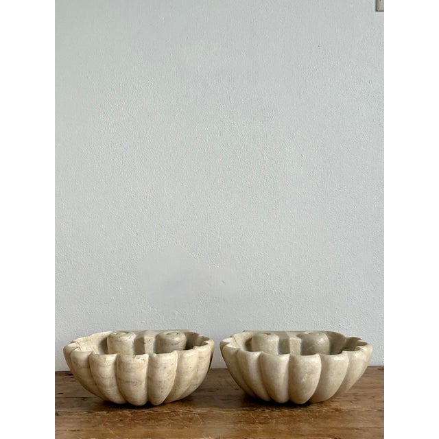 Imbue your space with the romance of antiquity and the serenity of the coast with this magnificent pair of vintage carved...