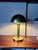 An absolute classic is this lamp from the 1970s from WSB in the Bauhaus style with a mushroom lampshade. The brass is in...