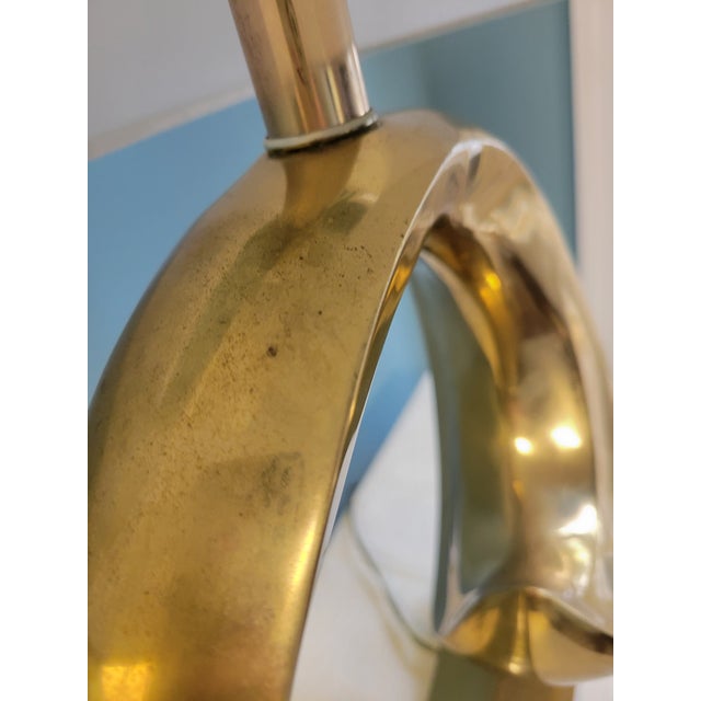 This glamorous post modern lamp is by Erwin Lambeth for Pierre Cardin. Done in Cardin's signature wave logo design, it...