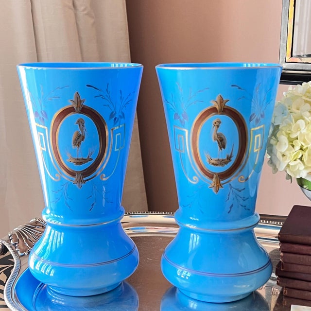 This is a stunning pair of LARGE vintage turquoise blue opaline glass vases, featuring exquisite hand-painted decoration...