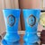 This is a stunning pair of LARGE vintage turquoise blue opaline glass vases, featuring exquisite hand-painted decoration...