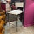 Great square-edge tubular chrome bar stool with white synthetic leather seat and back rest. The frame is in the most...