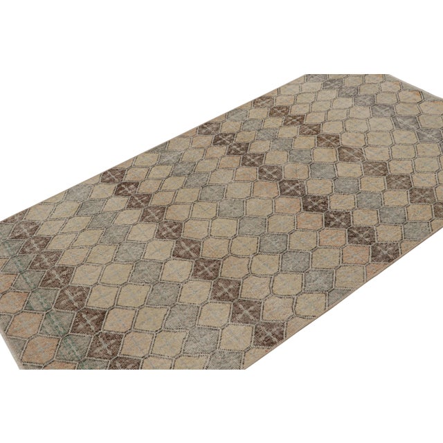 Handknotted in wool, this 4x6 vintage Art deco Zeki Múren rug originates from Turkey, circa 1960-1970 and is latest to...