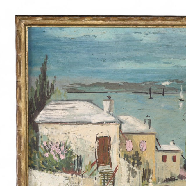 Transporting oil painting on board of a bayscape with houses, figures and boats executed in a loose impressionist style by...