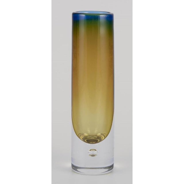 Scandinavian glass artist. Cylindrical art glass vase. with embedded glass bubble. Blue, yellow, and clear glass. Circa...