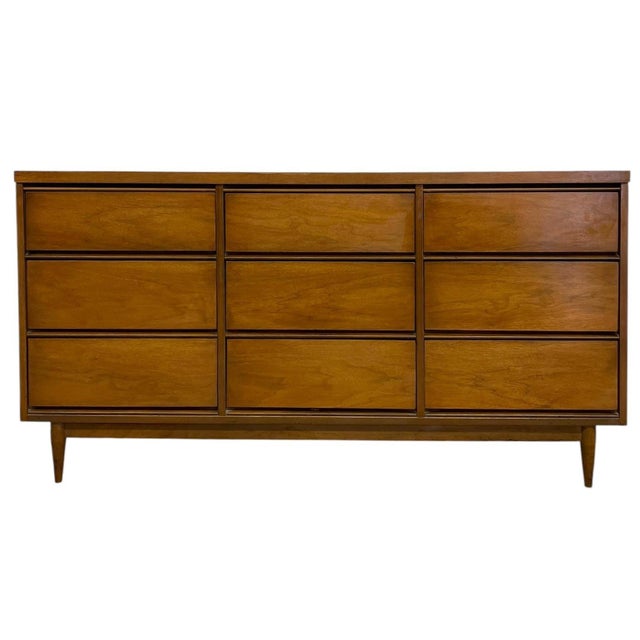 Each drawer is constructed with dovetail joinery and opens smoothly, offering ample storage across three rows. The drawer...