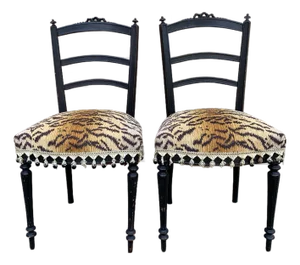A Pair of Ebonized Opera Chairs in Tiger Upholstery