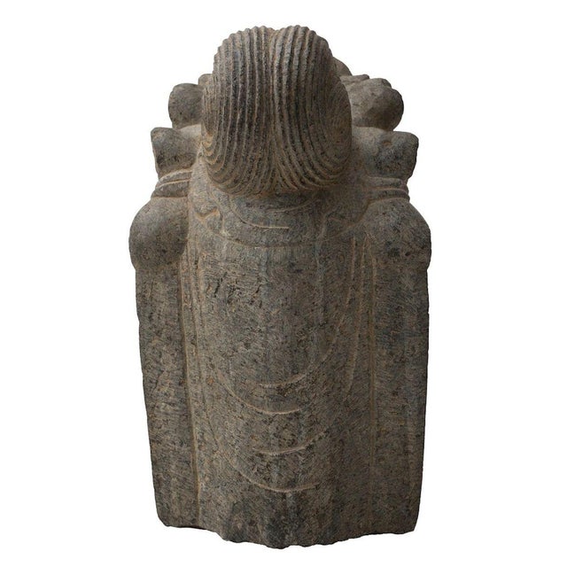 This Oriental divinity is a stone sculpture realized by Oriental manufacture in the XX century. Big sculpture representing...