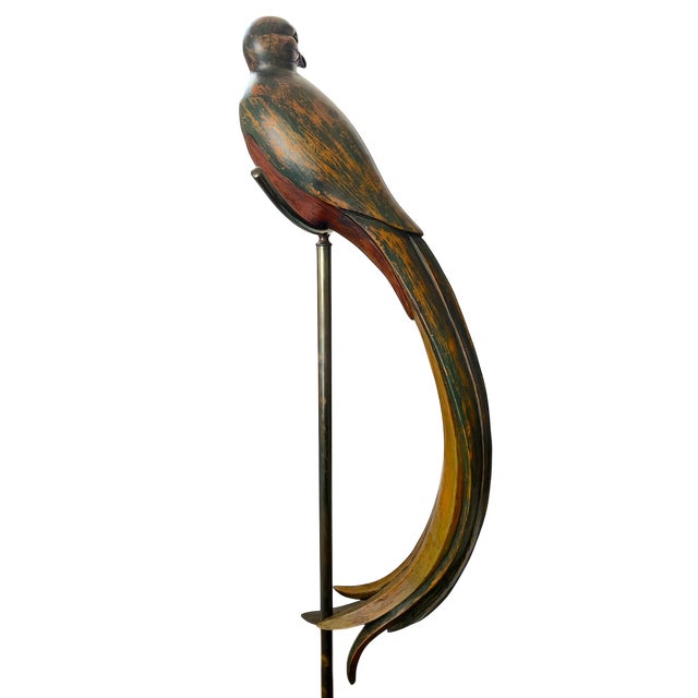 A true statement piece. This monumental hand-carved wood parrot stands an impressive 58 inches tall, perched elegantly on...