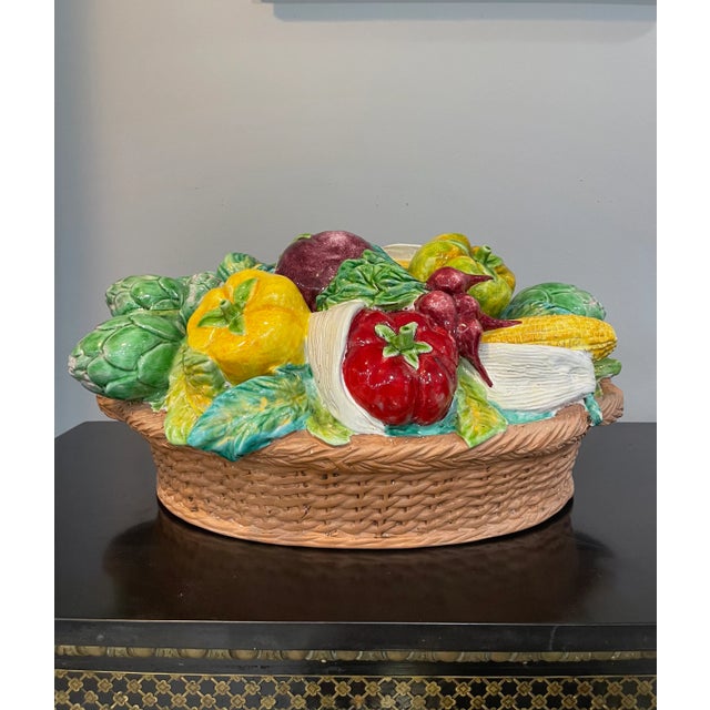 This large delicate and unique ceramic centerpiece is a handcrafted and hand painted pairing of colorful fruits and...