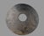 Large and highly decorative Chinese-style carved hardstone bi disc featuring elaborate relief and incised decoration on...
