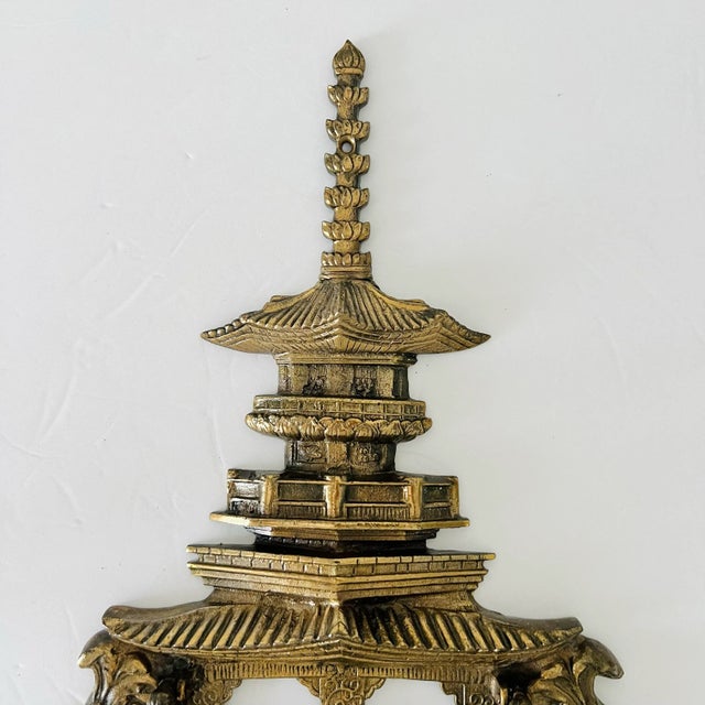 A Grand Entrance: The Pagoda Door Knocker of Distinction Step back in time and elevate your entryway with this magnificent...