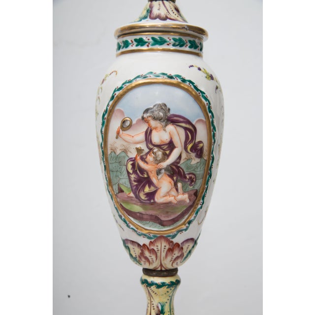 This delightful pair of porcelain Capodimonte vases have been converted to table lamps. The vases have a raised pattern...