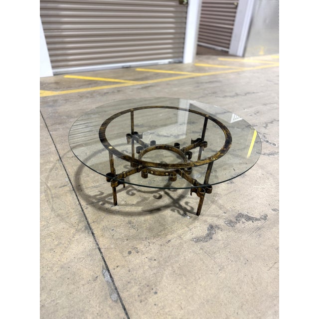 Elevate your living space with this striking MId-Century Modern Spanish Revival coffee table. Crafted with a heavy, hand-...