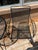 Woodard Style Mid-Century Modern Black Wrought Iron Mesh Bistro Set - 3 Pieces For Sale - Image 6 of 8