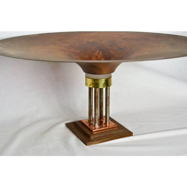 Unique statement piece. Stunning copper pedestal bowl with textured glass insert. Copper has a mottled finish applied to...