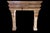This substantial 20th-century French fireplace is hand-carved from limestone and showcases strong architectural lines with...